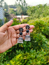 Three Step Floral Stone Studded Oxidized Jhumka with Pearl Droplets - Black